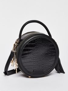 Textured round crossbody bag bought thanks to Styli discount code